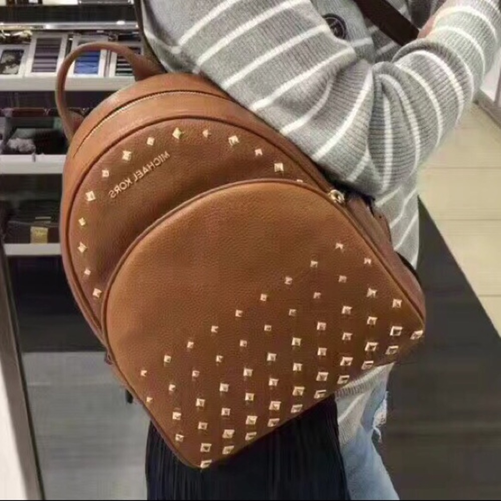 Michael kors brown leather backpack with studs